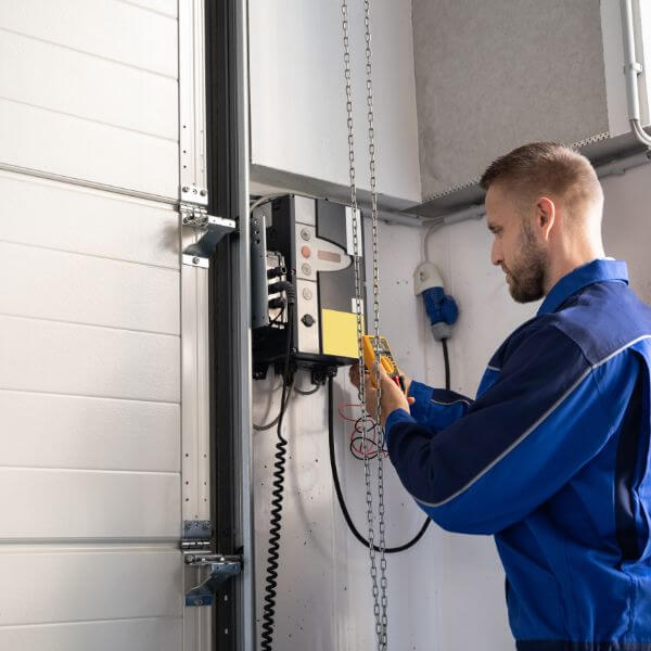 Garage Door Guys Sydney carrying out a garage door opener replacement with full testing to ensure smooth and safe door operation.